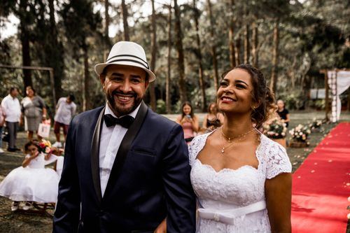 Couple laughing together at their wedding